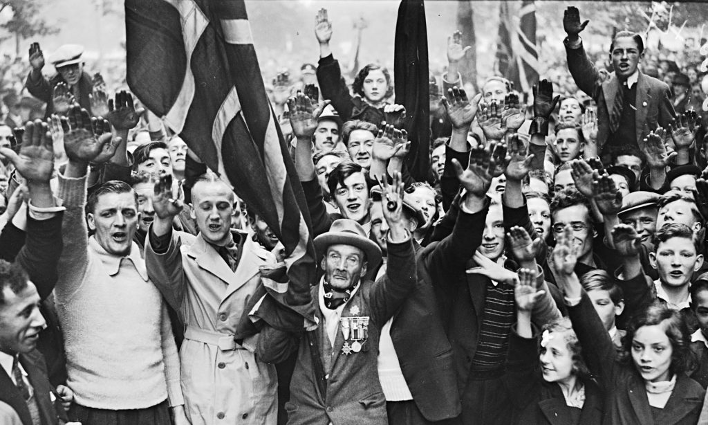 fascist-British fascists demonstrating in London in 1937. The desire to belong and the surge of emotions in a crowd can sweep up even the enemies of that ideology