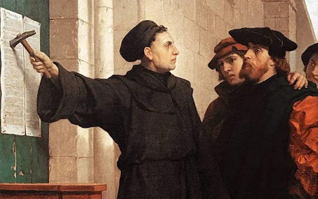 Ferdinand_Pauwels_-_Luther_hammers_his_95_theses_to_the_door