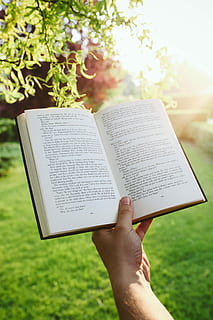 book-hands-reading-man-thumbnail